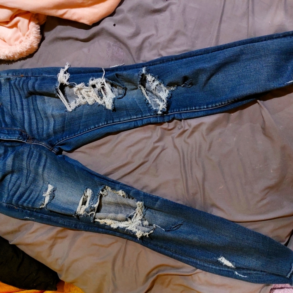 Distressed Blue Denim Jeans